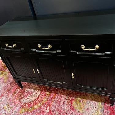 Black painted side board credenza 48.5” x 18” x 33” Call 202-232-8171 to purchase