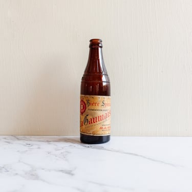 vintage french &quot;la gaumaise&quot; embossed glass beer bottle