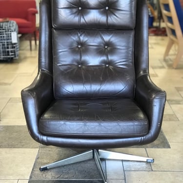 Mid Century Tufted Leather Swivel Armchair