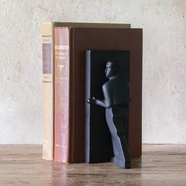 The Pushing Man Bookend, Vintage Heavy Black Bookend by Chris Collicut 