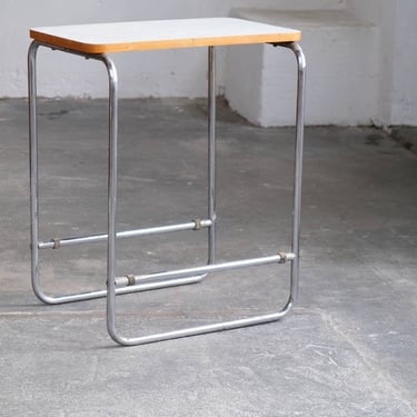 Tubular steel side table with white bakelite plate 