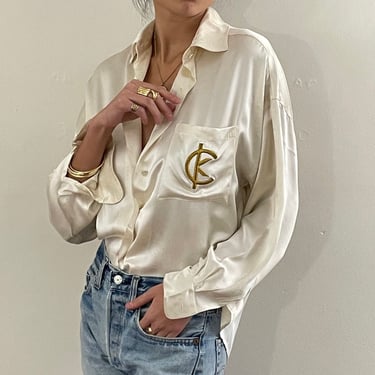 90s silk charmeuse blouse / vintage ivory liquid silk charmeuse Calvin Klein embroidered logo blouse | M 