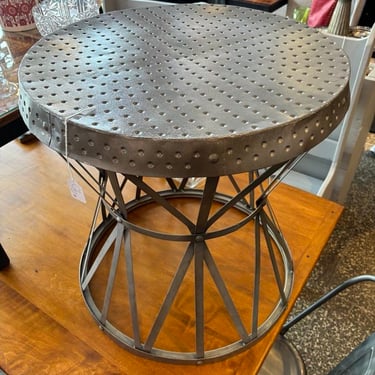 Metal side table 21” x 23” high, there are two Call 202-232-8171 to purchase