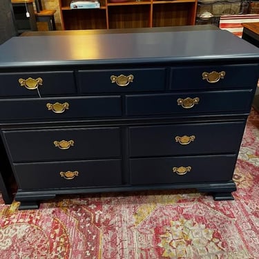 Blue painted 9 drawer dresser 50” x 20” x 35” 