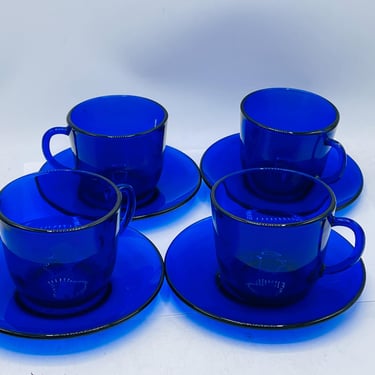 Vintage set of (4)  of Cobalt Blue Glass Tea Cups and Saucers Coffee Mugs Cups 