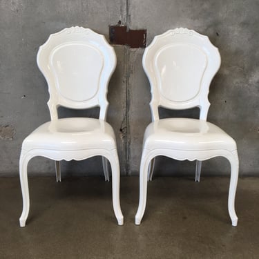 Pair Of White Fancy Molded Chairs From Warner Brothers