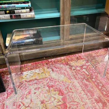 Bent acrylic coffee table, 24.5” x 14.25” x 12” 