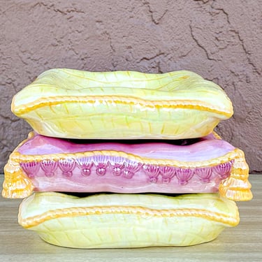 Stack of Pink and Yellow Ceramic Pillows