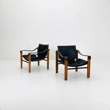 Set of  2 Mid century black leather Safari armchairs from Arkana by Maurice Burke, United Kingdom 1970s Scotland 