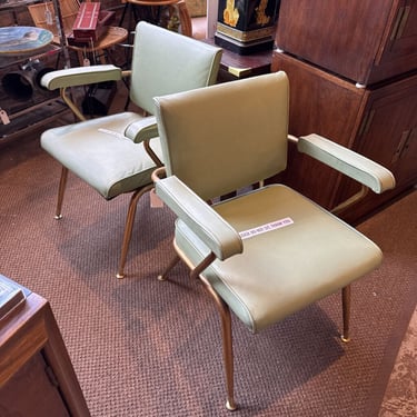 pair of brass color frame industrial-style desk chairs. C.1950s