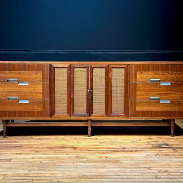 American of Martinsville Nine Drawer Walnut and Cane Lowboy Dresser Credenza Sideboard by Merton Gershun - Mid Century Modern Furniture 