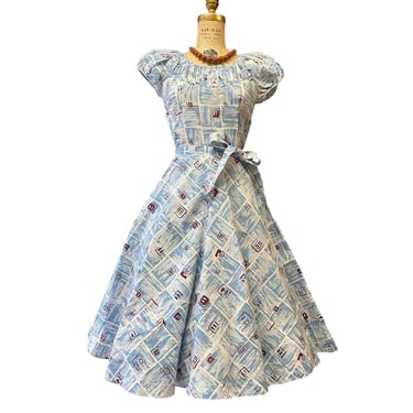 Vintage 1950s novelty print fit and flare dress blue and white cotton small 26 