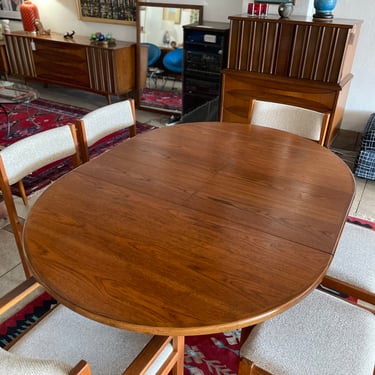 Mid Century Teak Round to Oval Dining Table with Butterfly Leaf Designed by Victor Wilkins for GPlan