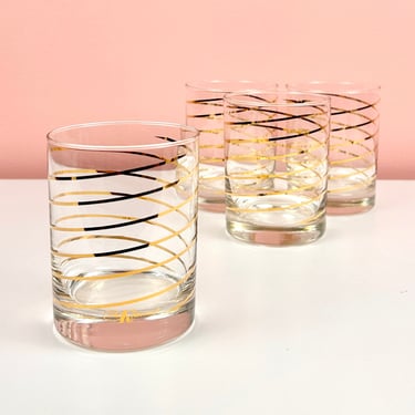 Set of 4 Kraftware Gold Swirl Glasses 