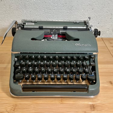 Mint 1957 Olympia SM3 Portable Typewriter with Case, Key, New Ribbon, Owner's Manual, Cleaning Kit 