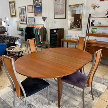 Mid Century Teak Round to Oval Dining Table with Butterfly Leaf by A.H. McIntosh