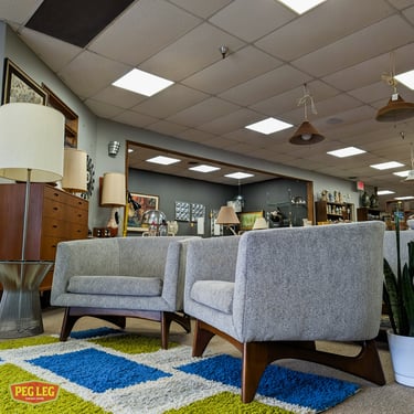 Pair of Mid-Century Modern club chairs with walnut bases by Adrian Pearsall
