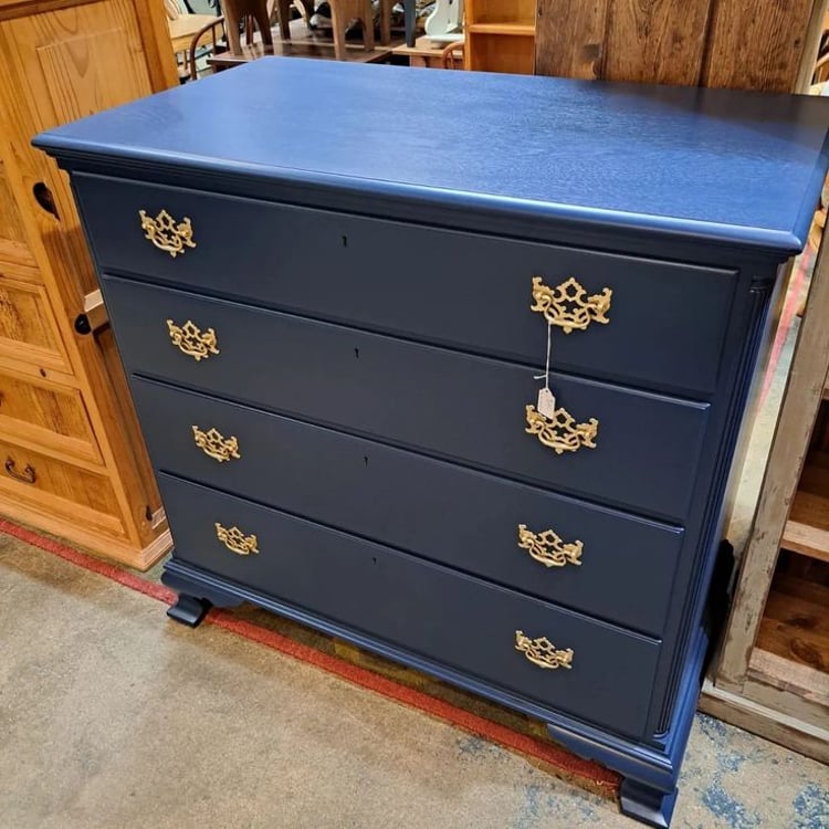 Navy blue traditional 4-drawer chest. Measures 43 wide X 24 deep X 43 high. 