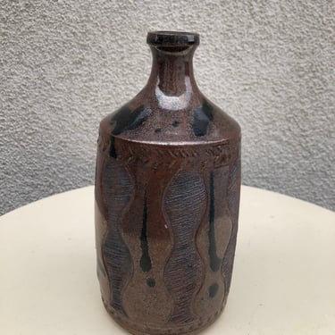 Vintage brown textured pottery decanter or sake jug or oil bottle signed Norma 8” x 3.5” 