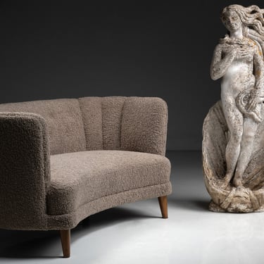 Curved Sofa, 60 inches / Statue of Venus, 54.5 inches