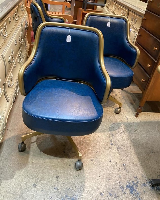 Blue and gold mid century rolling chairs. 3 available 23.5” x 20” x 32.5” seat height 17” Call 202-232-8171 to purchase