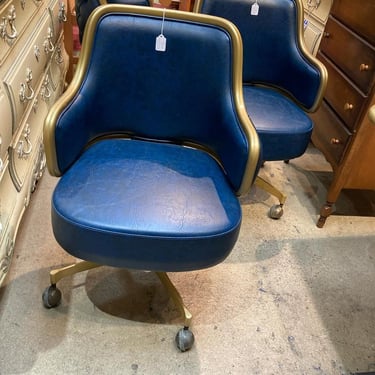Blue and gold mid century rolling chairs. 3 available 23.5” x 20” x 32.5” seat height 17” Call 202-232-8171 to purchase