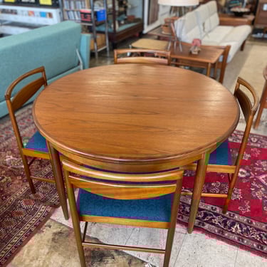 Mid Century Teak Round to Oval Dining Table with Hidden Butterfly Leaf by GPlan