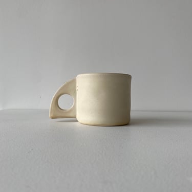 Handmade porcelain angular handle mug 