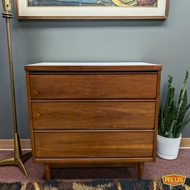 Mid-Century Modern walnut bachelor's chest with white laminate top