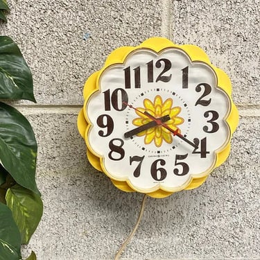 Vintage Wall Clock Retro 1970s Mid Century Modern + General Electric + Yellow Plastic + Flower Shape + Plug In + Numbered Face + Wall Decor 