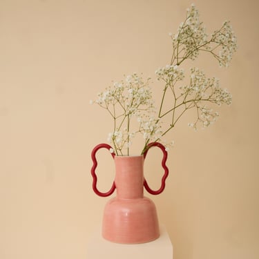 Pink handmade ceramic vase with wiggle handles 