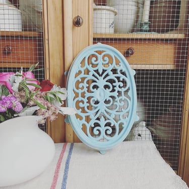 Beautiful rare finds vintage French cast iron oval blue trivet 