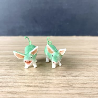 Miniature artisan made pair of green pigs 