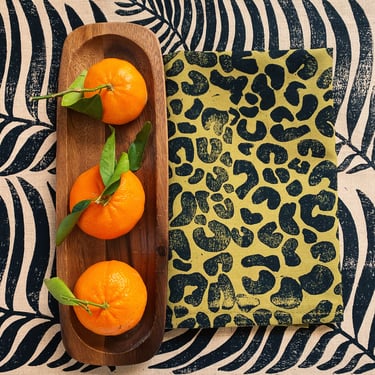 linen dinner napkins. black cheetah print on green. hand block printed. placemats / tea towel. tropical. boho decor. leopard. animal. 