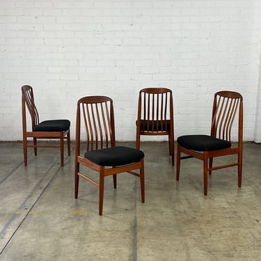 Sculpted teak dining chairs- set of four 