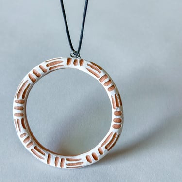 Liberation Hoop Pendant - Carved - White