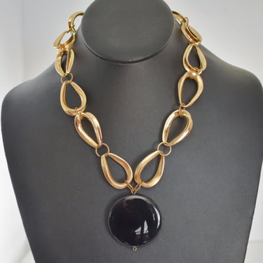 Atomic 60's gold tone metal teardrop links blue black glass necklace, big edgy mid-century affixed round glass pendant 