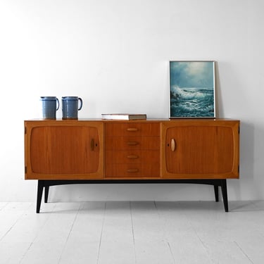 Scandinavian Vintage Teak Sideboard with Raised Door Profiles and Black Legs 