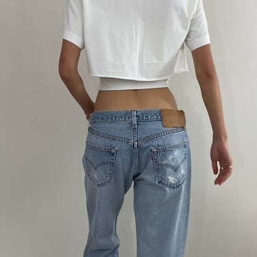 Vintage 80s Levi's 501 faded button fly medium wash red tab patched knee Levis iconic jeans size 32 x 29