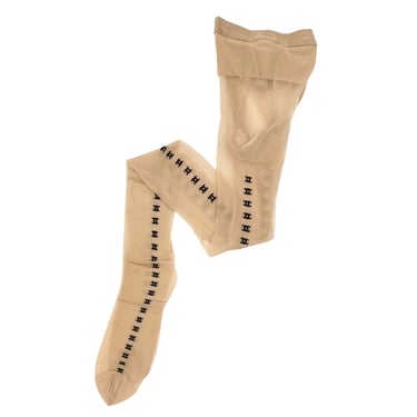 Chanel Nude + Black Logo Tights