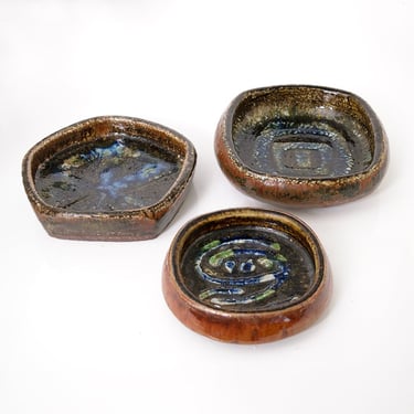 Group of three Carl-Harry Stalhane hand thrown and decorated bowls for Rorstrand, Sweden