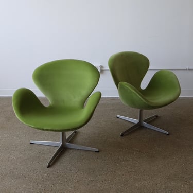 Early Arne Jacobsen “Swan” Chairs, a pair