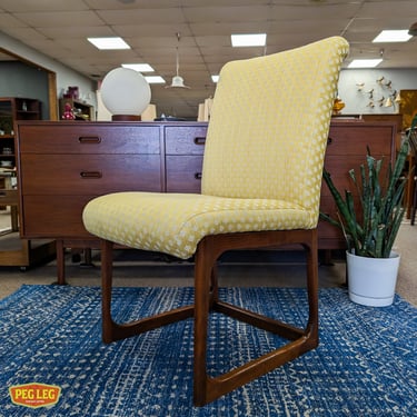 Mid-Century Modern accent chair with walnut frame