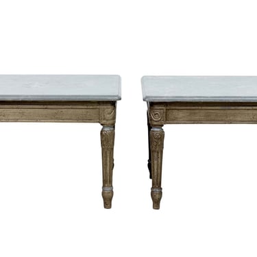 A pair of painted french style side tables