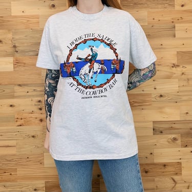 90's Vintage Jackson Hole Wyoming I Rode The Saddle At The Cowboy Bar Tee Shirt T-Shirt 