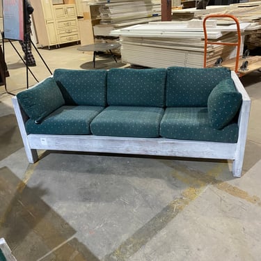 Rustic Wooden Sofa with Dark Green Patterned Cushions