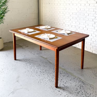 Danish Modern Teak Refractory Dining Table with 2 hidden leaves circa 1960s