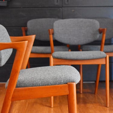 Four Danish modern teak Kai Kristiansen "Z" dining chairs w/new gray upholstery, model 42 