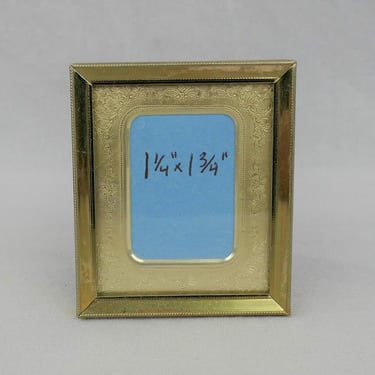 Vintage Small Picture Frame - Gold tone Metal with Metal Embossed Mat  - Mat displays about 1 1/4" x 1 3/4" of a 2 1/4" x 2 3/4" Photo 