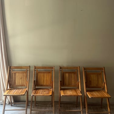 Pine folding chairs. Sold in pairs.